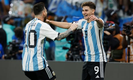 One each: Julian Alvarez celebrates with Lionel Messi after scoring.