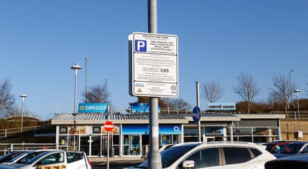 A sign in a private car park warns of an £85 penalty charge for overstaying.