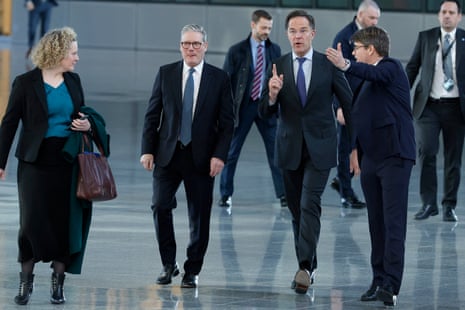 Keir Starmer (centre-left) arriving at Nato HQ, where he was met by the Nato secretary general Mark Rutte (centre-right)