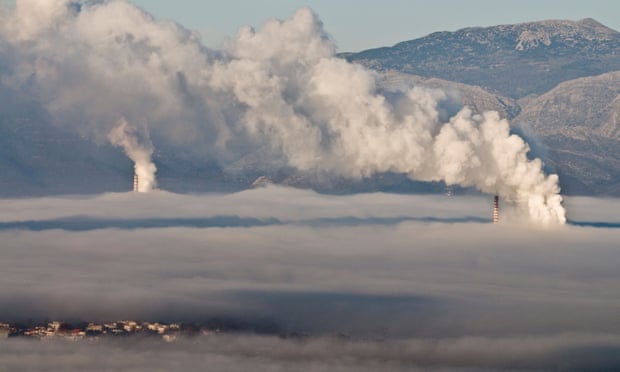 The town of Megalopoli bottom left shrouded in fog, and smog from the local power stations, Arcadia, Greece