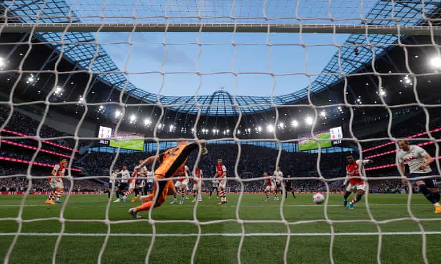 Harry Kane (right) stoops to double Tottenham's lead.