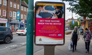 Covid live news: UK reports 31,772 daily infections and 26 new deaths; new restrictions in Libya after record cases | World news 4 Vaccination sign in West Drayton, London.
