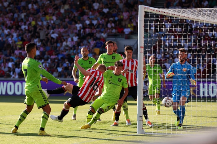 Ben Mee nods home Brentford’s third goal.