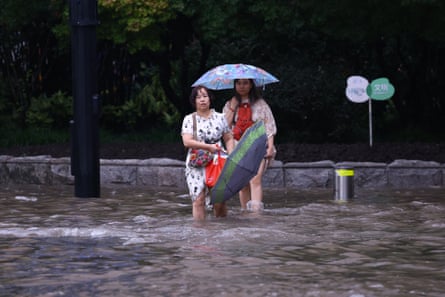Heavy rain and strong winds hit the city of Shanghai on Monday due to Typhoon Dolphin.