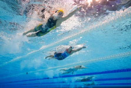 Australia’s Ariarne Titmus and the US’s Katie Ledecky compete in a heat of the women’s 100m butterfly during the Paris 2024 Olympic Games.
