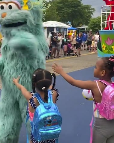 In this image from video posted to Instagram by Jodi Brown, Rosita waves off Brown’s daughter and niece at the Sesame Place.