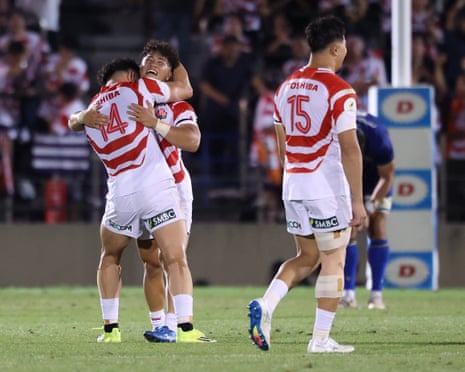 Kazuma Ueda and Ryunosuke Ito celebrate as Japan defeat Italy in a Nations Championship Test in Tokyo