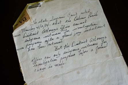 A law book handwritten on a curling and worn piece of paper