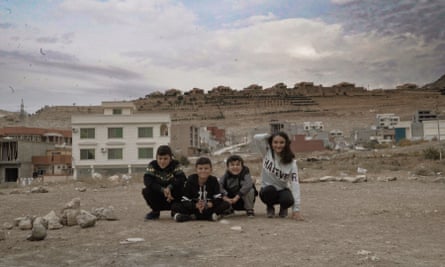 Mediha Ibrahim Alhamad with her three brothers