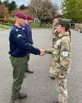Pte Addy Carter being presented with her maroon beret by Maj Chris Braithwaithe