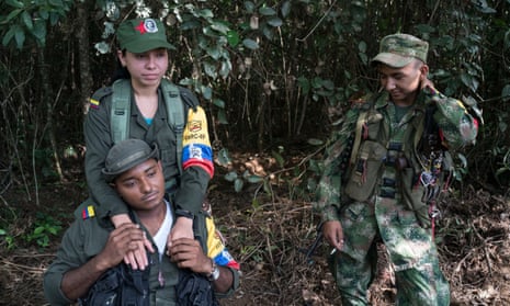 Guerrilla fighters of the Farc’s Bloque Magdalena Medio relax as their leaders prepare to sign a historic deal to end their 52-year war.