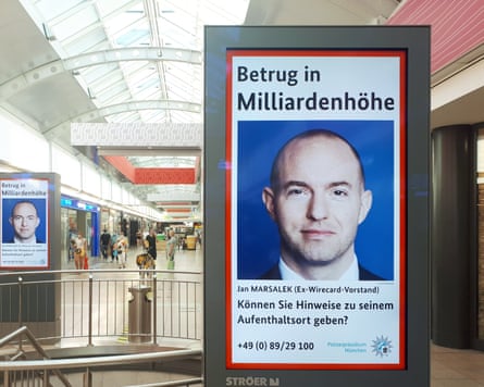Posters of Interpol red notice for the fugitive Jan Marsalek in a shopping centre in Germany in 2020.
