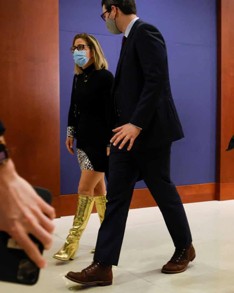 Kyrsten Sinema donned gold knee-high boots during this 20 April visit to the US Capitol.