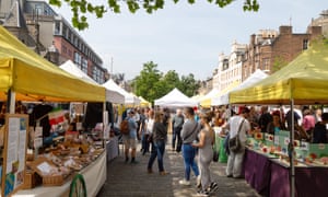 People shopping in the weekly market, Grassmarket, Edinburgh