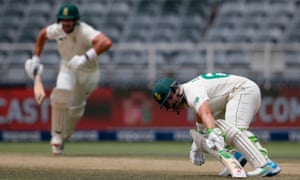 Dean Elgar (right) and Aiden Markram run between the wickets.