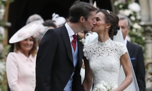 Middleton and Matthews kiss after their wedding.