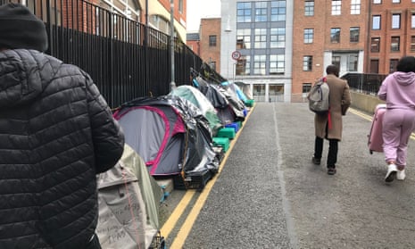 Asylum seekers camp in a lane beside Ireland's International Protection Office in Dublin.