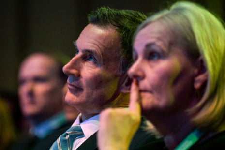 Jeremy Hunt watching Rishi Sunak give a speech at the Business Connect event yesterday.