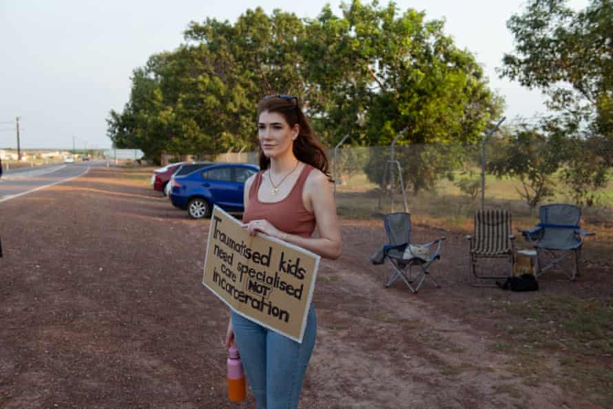 Samantha Samson is one of the Don Dale protesters that protest every Friday at 5pm. She holds a sign that reads ‘Traumatised kids need specialised care not incarceration’.
