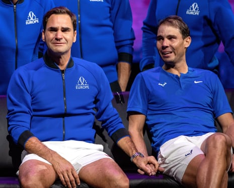 Roger Federer and Rafael Nadal crying and holding hands