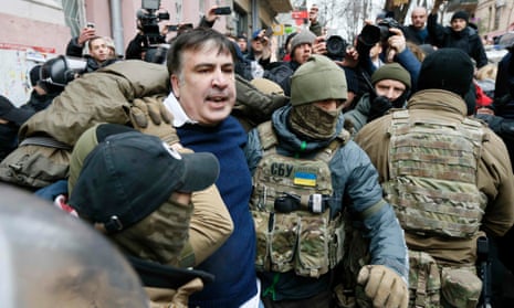 Mikheil Saakashvili being detained in Kiev earlier this week. He was later freed by supporters.