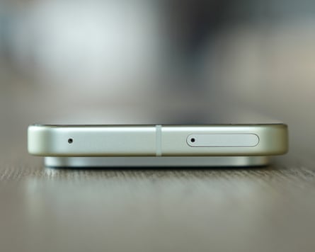 The nano sim slot in the top of a non-US Google Pixel 10.