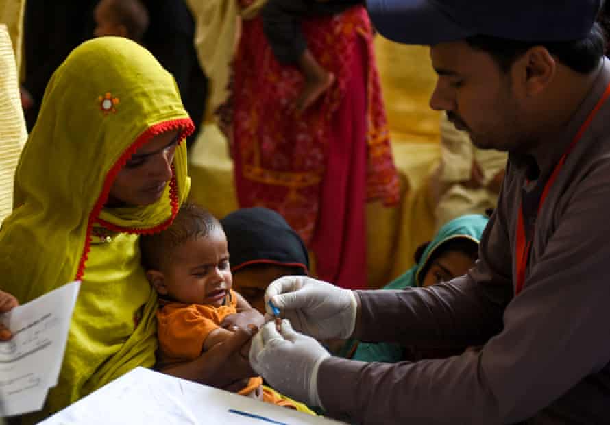 A child is tested for the virus in Rato Dero, Pakistan.