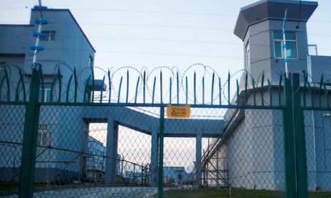 The gates and guard towers of a re-education camp