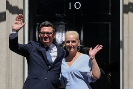Andy Burnham with his wife, Marie-France van Heel, waving outside No 10