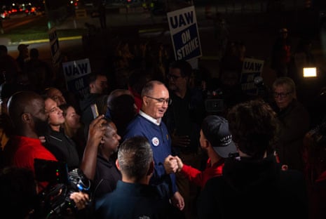 UAW (United Auto Workers) president Shawn Fain speaks with members of the media and members of the UAW outside of the UAW Local 900 headquarters across the street from the Ford Assembly Plant in Wayne, Michigan on September 15, 2023.