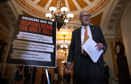 a man stands next to an easel holding a sign