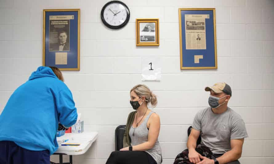 People wait to receive their Covid vaccines in Lima, Ohio.