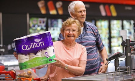 Customers shop for essentials at a Coles supermarket