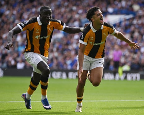 Mohamed Belloumi celebrates scoring Hull's second goal during the Premier League match at Stamford Bridge.