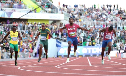 Fred Kerley spreads his arms and pips his US teammates to the 100m gold medal