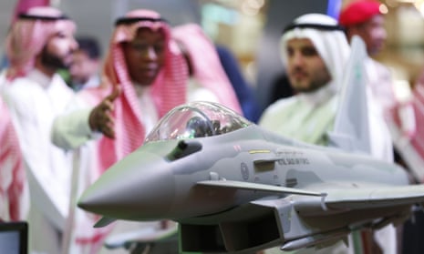 Visitors to an exhibition in Riyadh look at a model of the Saudi air force’s Eurofighter Typhoon, which is manufactured by BAE Systems