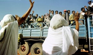 Ex-fighters of the Eritrean People’s Liberation Front depart from Asmara to the Ethiopian border in 1998.