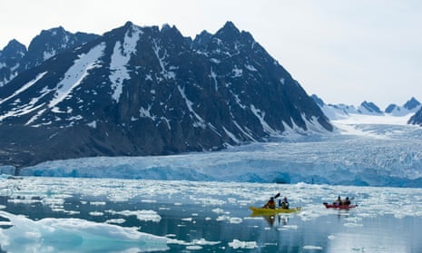 Kayaking at Monaco glacier in the Arctic Ocean