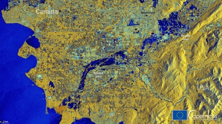 A satellite image of flooding around the US-Canada border.