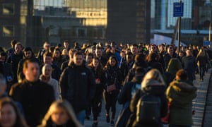 Commuters cross London Bridge