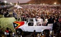 Pope Francis waves to the crowd on the day of the Holy Mass at the Esplanade of Taci Tolu in Dili, East Timor.