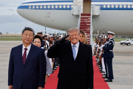 Donald Trump winced at a loud US military flyover during an arrival ceremony for China’s president, Xi Jinping, at Joint Base Andrews in Maryland on Wednesday.
