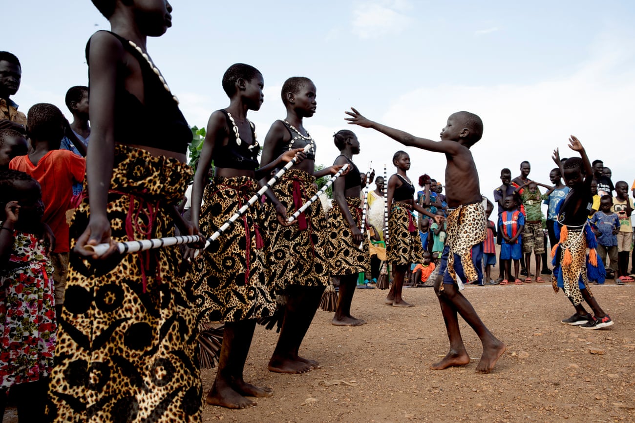 The Maale dance group perform at a camp for internally displaced people in the suburbs of Juba