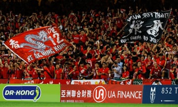  Hong Kong fans at the Hong Kong-Iran World Cup qualifier on Thursday. Three dans were arrested at the match for failing to stand for the Chinese national anthem and turning their backs.
