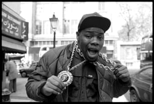 Biz Markie in London, 1988 ‘He was a real ham’ says Corio. ‘Jumping on to cars, constantly making faces – it made him easy to photograph. I asked to hold one of his rope chain necklaces: they were totally hollow and hardly weighed anything’