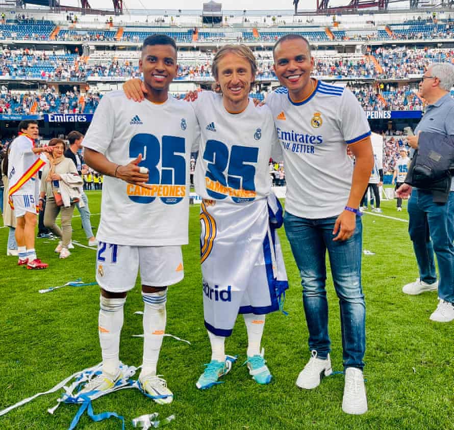 Real Madrid’s Rodrygo: ‘I was 100% sure we’d be in the final and it all worked out’ | Real Madrid 3 Rodrygo with his father Eric Goes and Luka Modric as Real Madrid celebrate winning La Liga.
