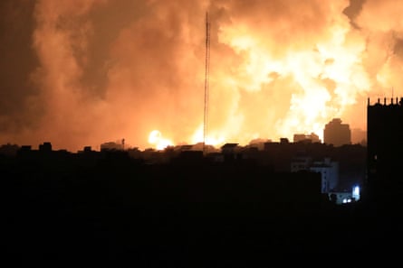 Smoke and flames rise during Israeli strike in Gaza City.