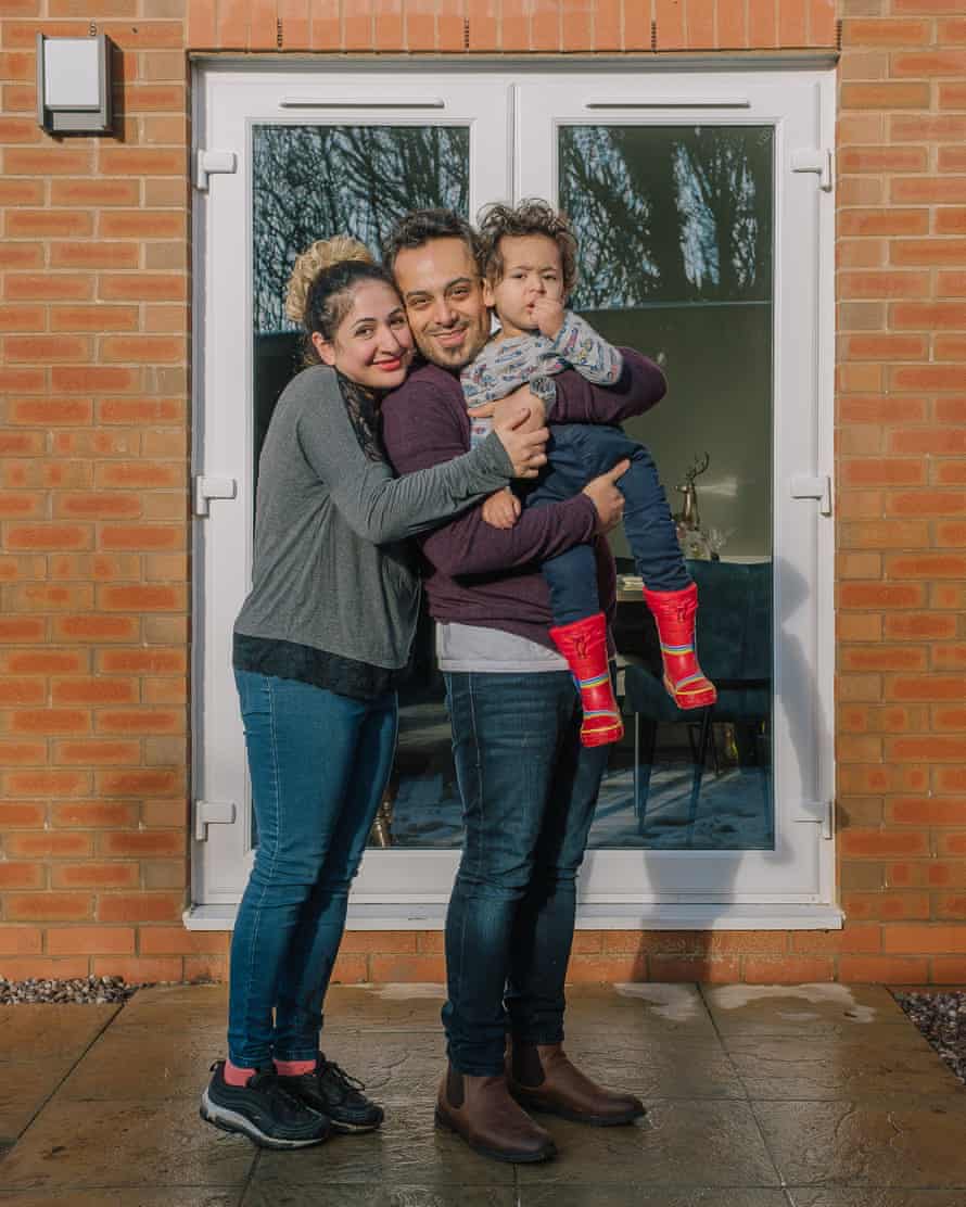 Mahboobeh Rajabi and Mohammad Tohidi with their son Liam, Manchester