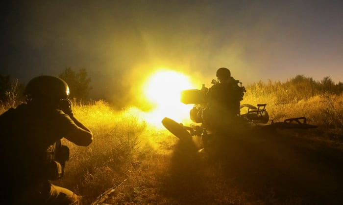 Ukrainian servicemen fire a ZU-23-2 anti-aircraft cannon at position near a front line in Kharkiv region, Ukraine on 24 August.