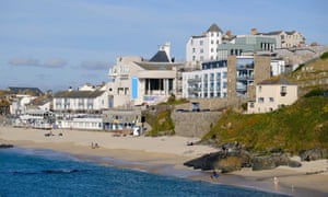 The Tate, St Ives seen across Porthmeor Beach, Cornwall, UK.